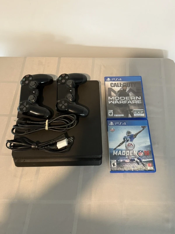 PlayStation 4 Slim 500GB Black + 2 Controllers and 2 Games